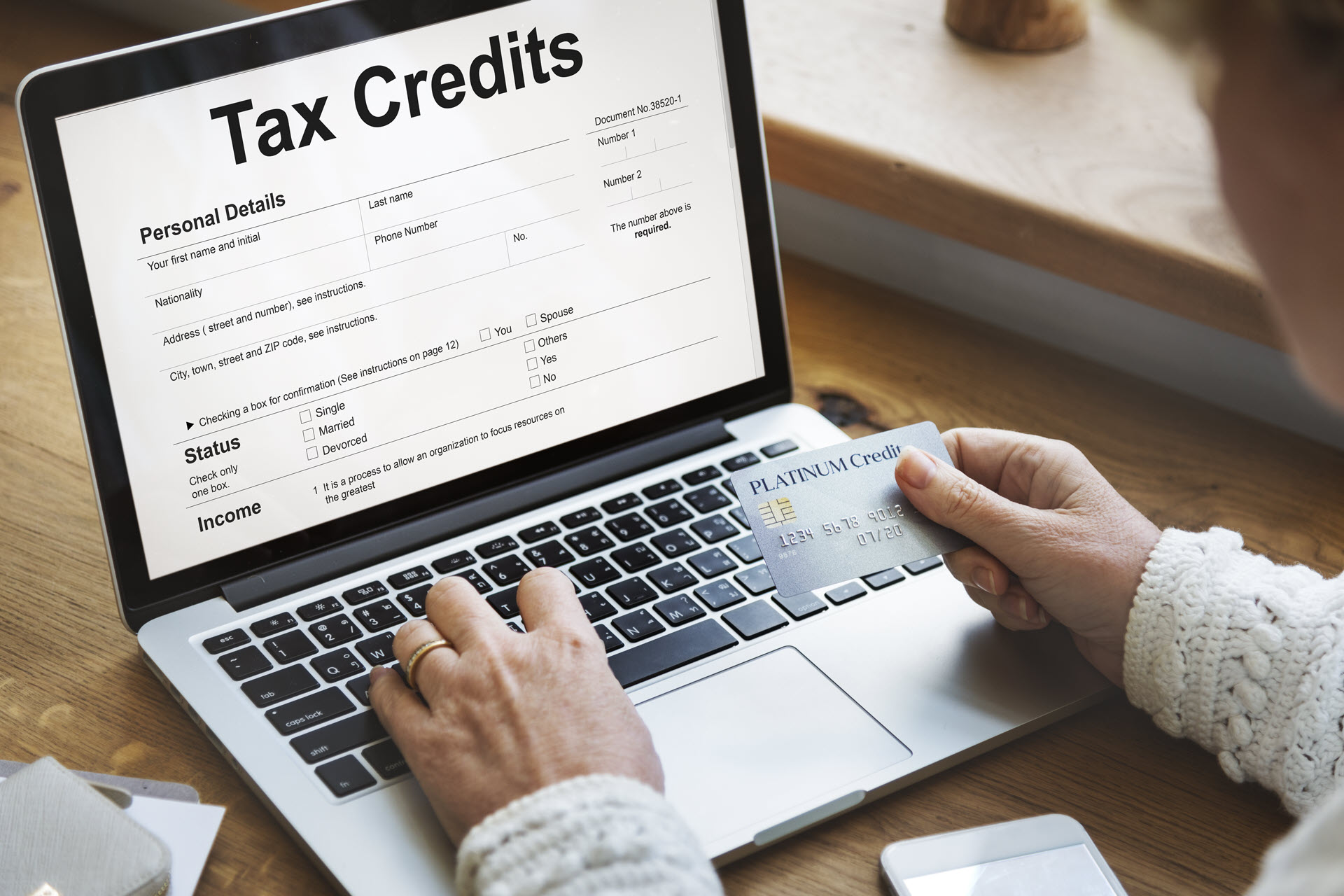 tax-credits-claim-return-deduction-refund-concept-PQ22EP9